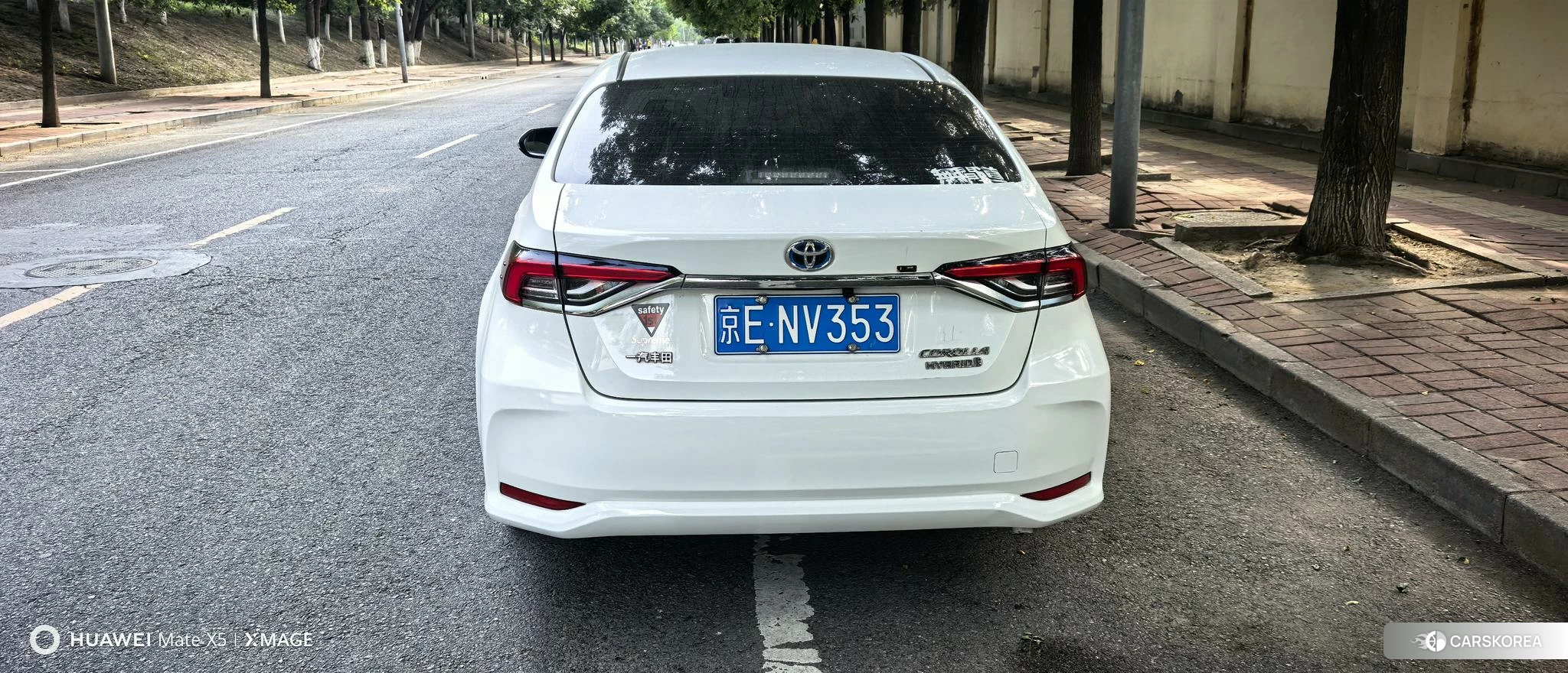Toyota Corolla 2023 Белый из Китая, фото 2