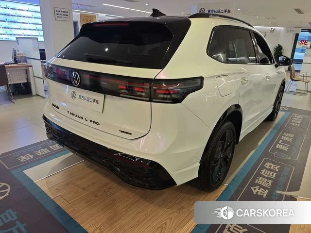 Volkswagen Tiguan L 2024 Белый из Китая, фото 2