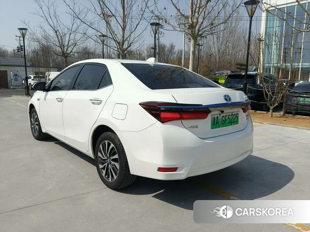 Toyota Corolla dual engine E+ 2023 Белый из Китая, фото 2