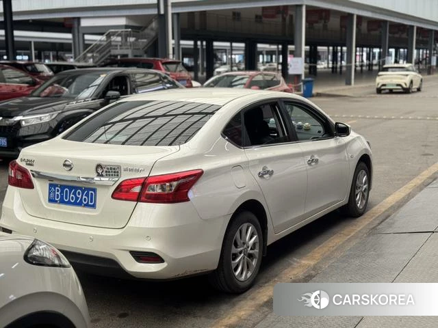 Nissan Xuan Yi 2022 Белый из Китая, фото 3