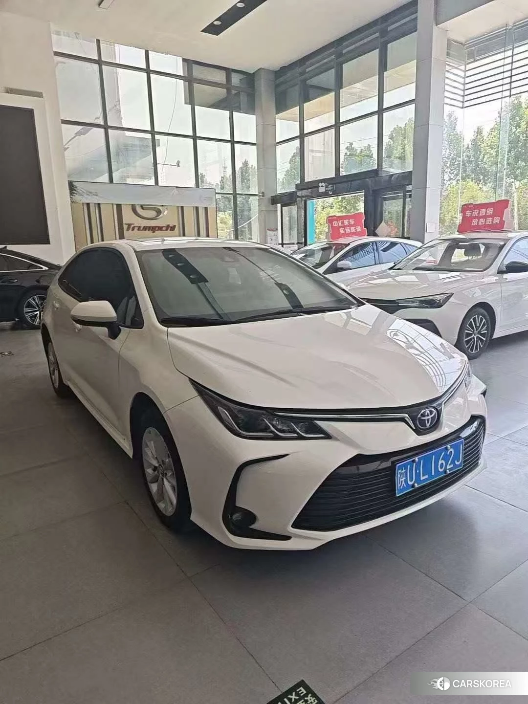Toyota Corolla 2023 Белый из Китая, фото 3