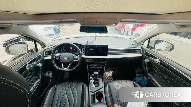 Volkswagen Tiguan L 2023 Белый из Китая, фото 3