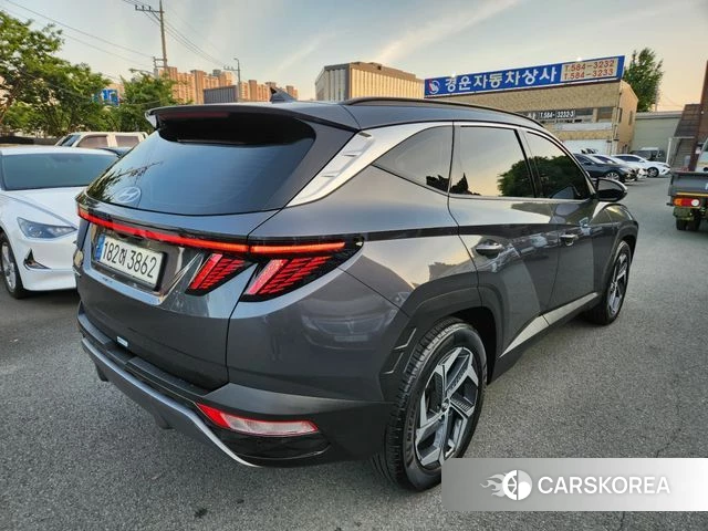 Hyundai Tucson (NX4) 2021 Серебристо-серый из Кореи, фото 4