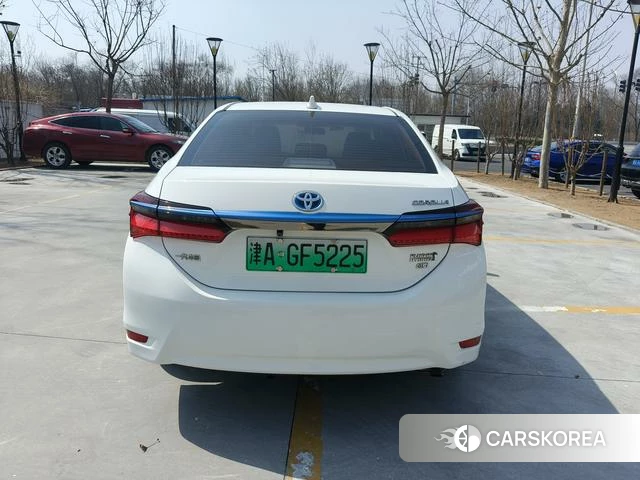 Toyota Corolla dual engine E+ 2023 Белый из Китая, фото 3