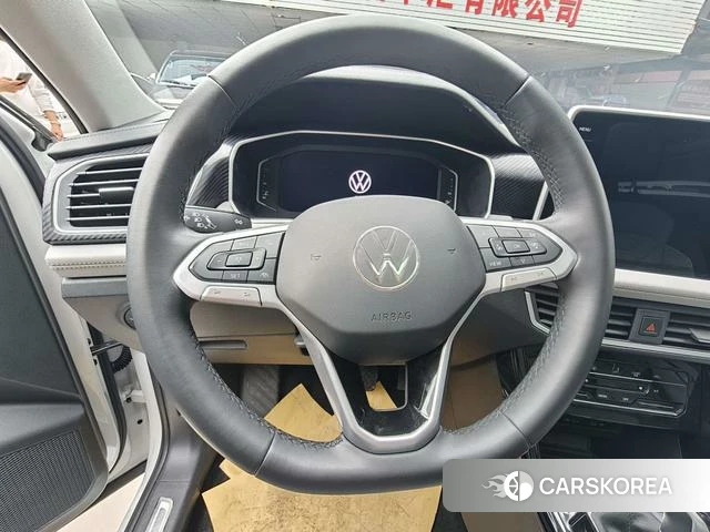 Volkswagen Tanyue 2024 Белый из Китая, фото 6