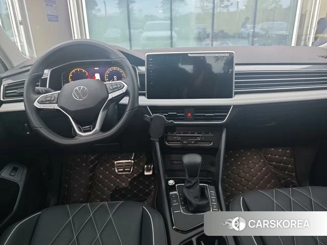 Volkswagen Tiguan L 2024 Белый из Китая, фото 3