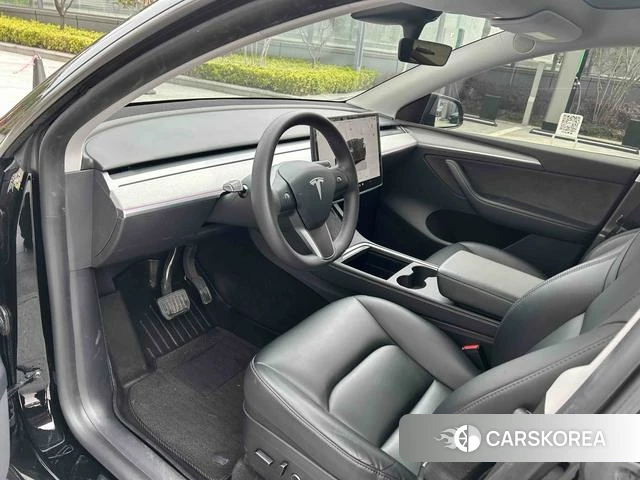 Tesla Model Y 2024 Черный из Китая, фото 4