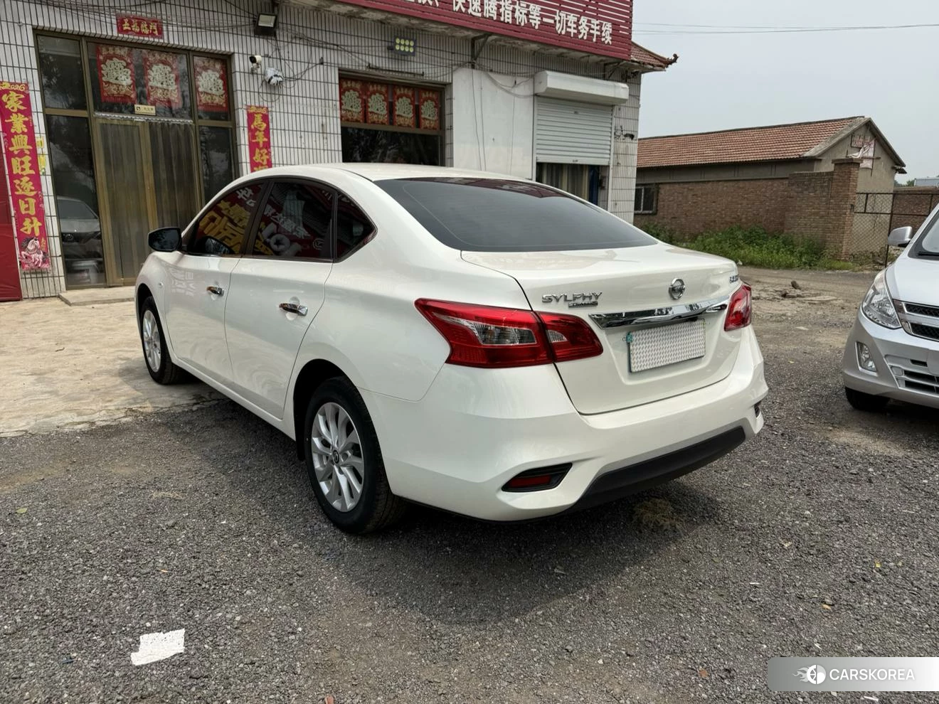 Nissan Xuan Yi 2024 Белый из Китая, фото 6