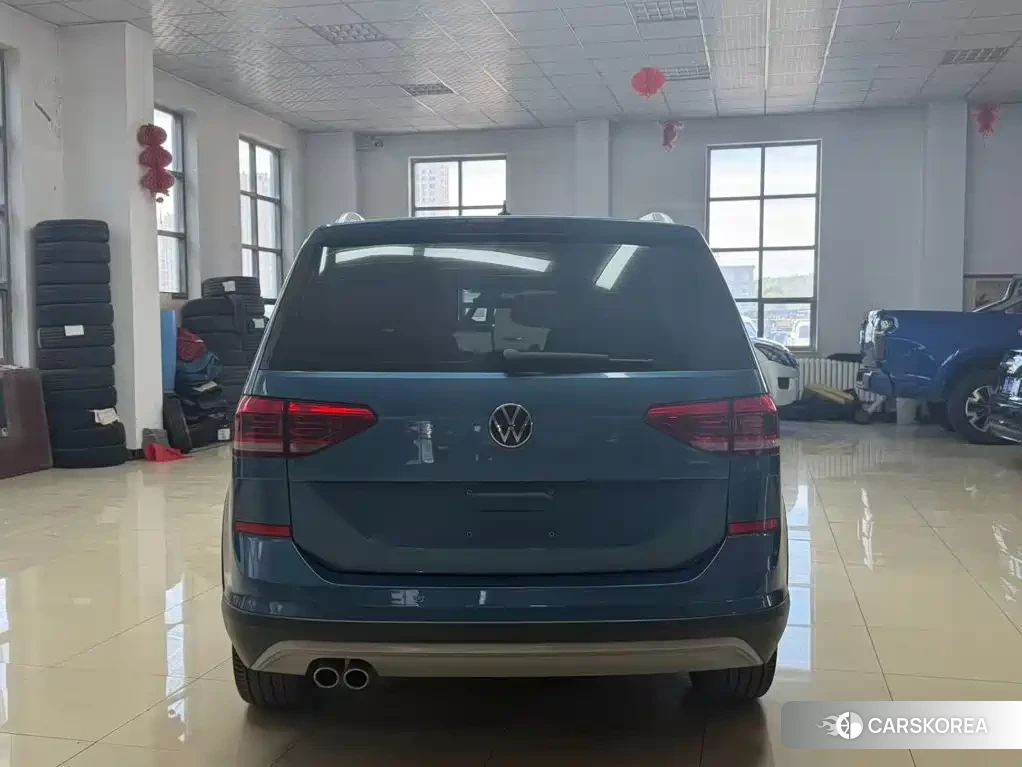 Volkswagen Touran L id 4685902 из Китая 20
