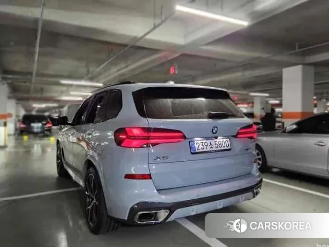 BMW X5 (G05) 2024 Небесно-голубой из Кореи, фото 4