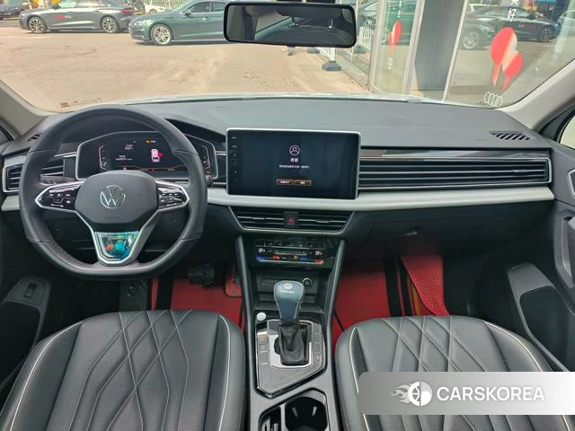 Volkswagen Tiguan L 2023 Белый из Китая, фото 4