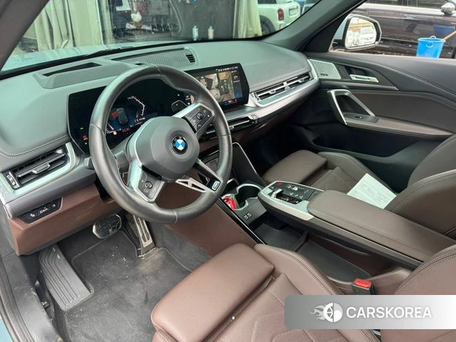 BMW X1 (U11) 2023 Темно-зеленый из Кореи, фото 6