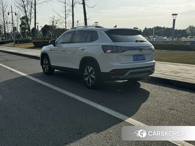 Volkswagen Tanyue 2023 Белый из Китая, фото 4