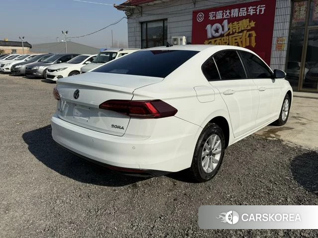 Volkswagen Bora 2022 Белый из Китая, фото 6