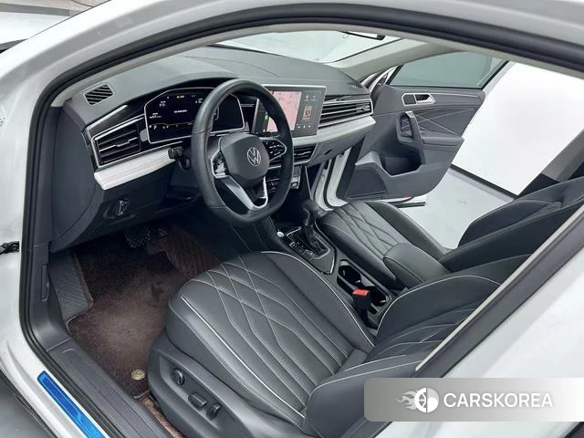 Volkswagen Tiguan L 2024 Белый из Китая, фото 4