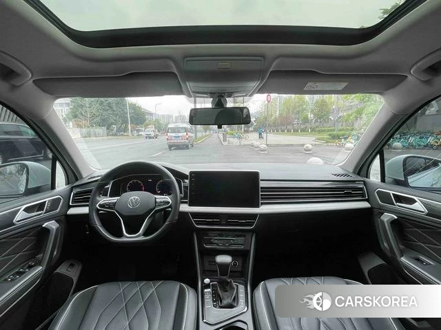 Volkswagen Tiguan L 2023 Белый из Китая, фото 4