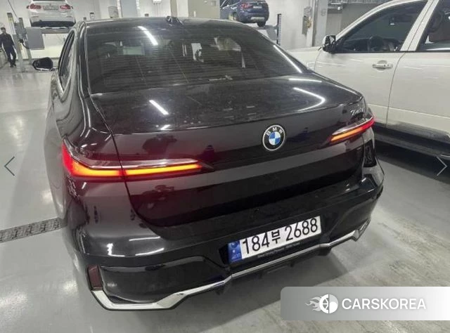 BMW 7 Series (G70) 2023 Черный из Кореи, фото 5