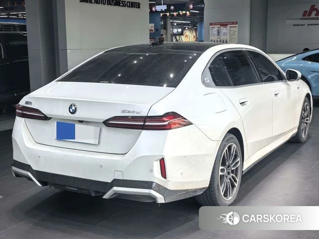 BMW 5 series 2024 Белый из Китая, фото 5