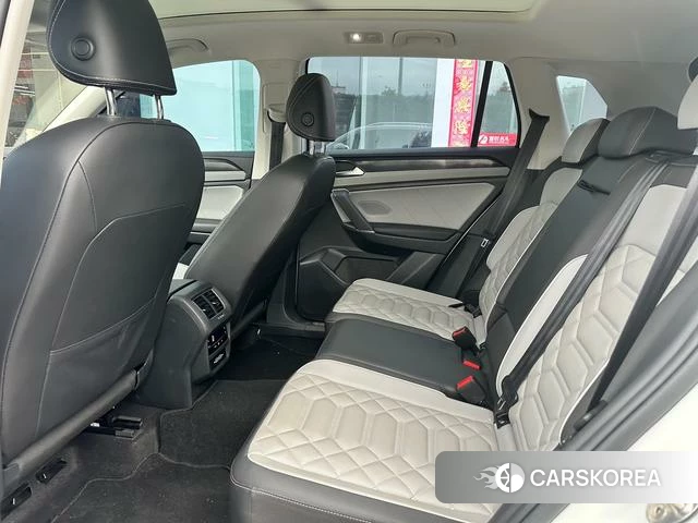 Volkswagen Tanyue 2023 Белый из Китая, фото 5
