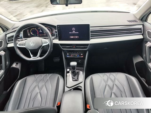 Volkswagen Tiguan L 2023 Белый из Китая, фото 5