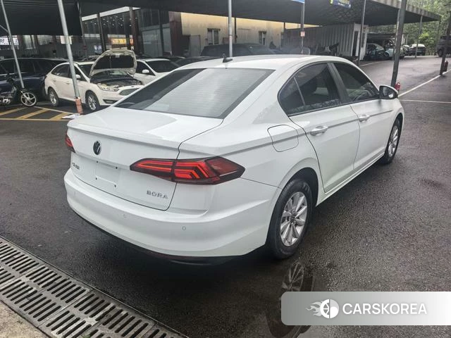 Volkswagen Bora 2022 Белый из Китая, фото 6
