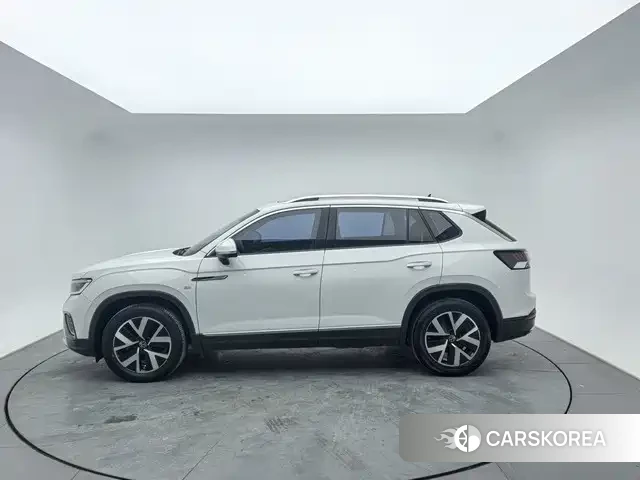 Volkswagen Tayron 2023 Белый из Китая, фото 5
