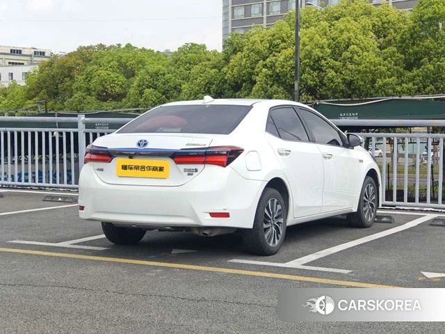 Toyota Corolla dual engine E+ 2021 Белый из Китая, фото 6