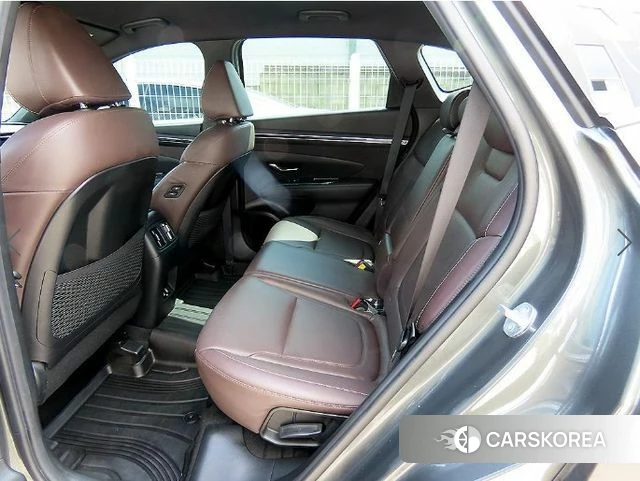 Hyundai Tucson (NX4) 2023 Серебристо-серый из Кореи, фото 6