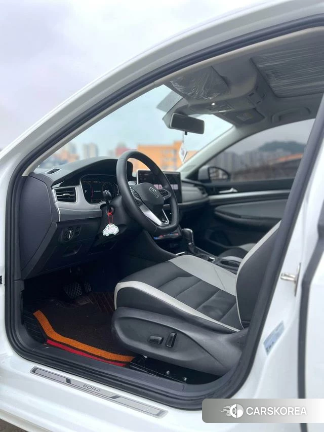 Volkswagen Bora 2024 Белый из Китая, фото 6