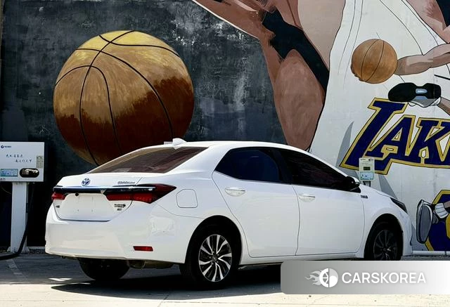 Toyota Corolla dual engine E+ 2022 Белый из Китая, фото 6