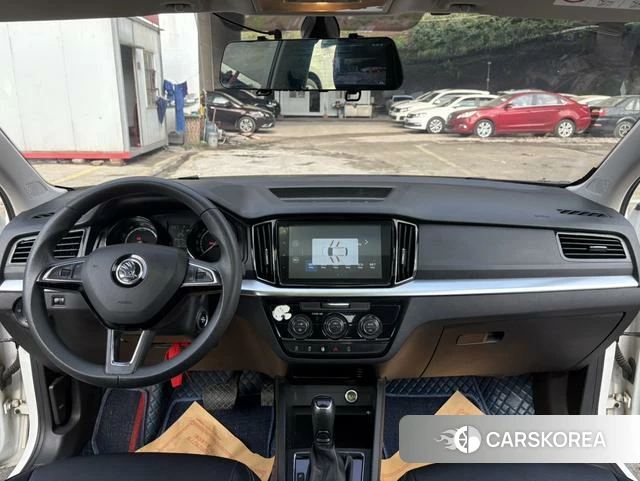 Skoda Komick 2023 Белый из Китая, фото 6