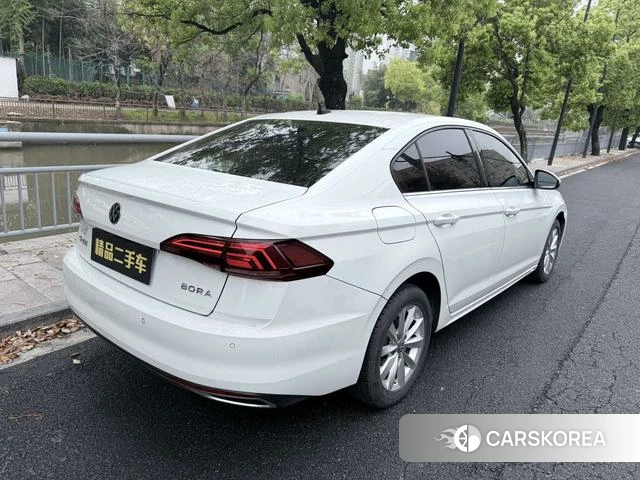 Volkswagen Bora 2022 Белый из Китая, фото 6