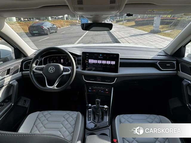 Volkswagen Tanyue 2023 Белый из Китая, фото 6
